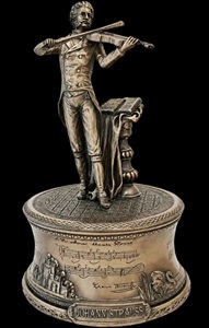 Johann Strauss musikfigur med hånddrevet musik